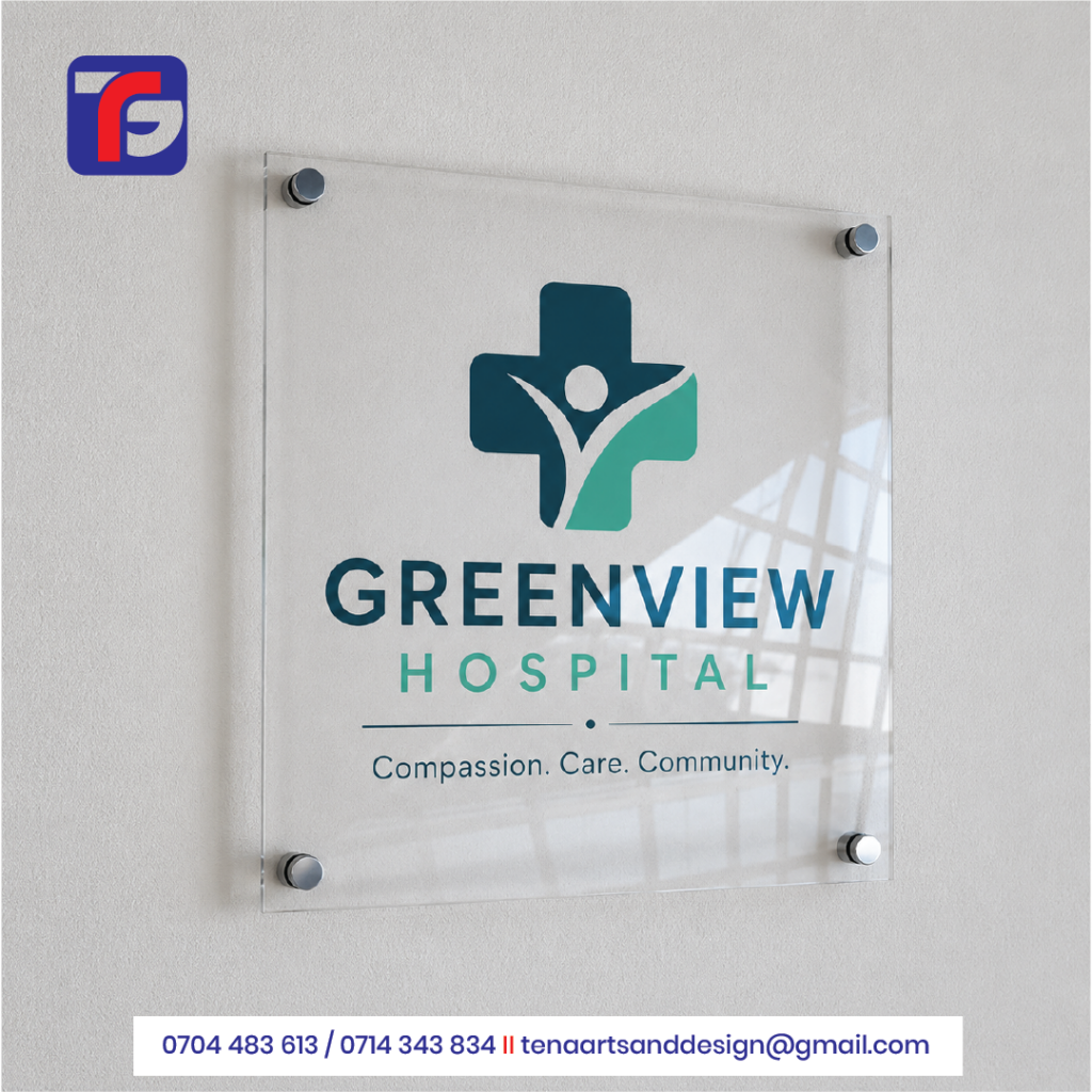 Clear acrylic reception sign displaying the Greenview Hospital logo and tagline, wall-mounted with four metal standoff fittings